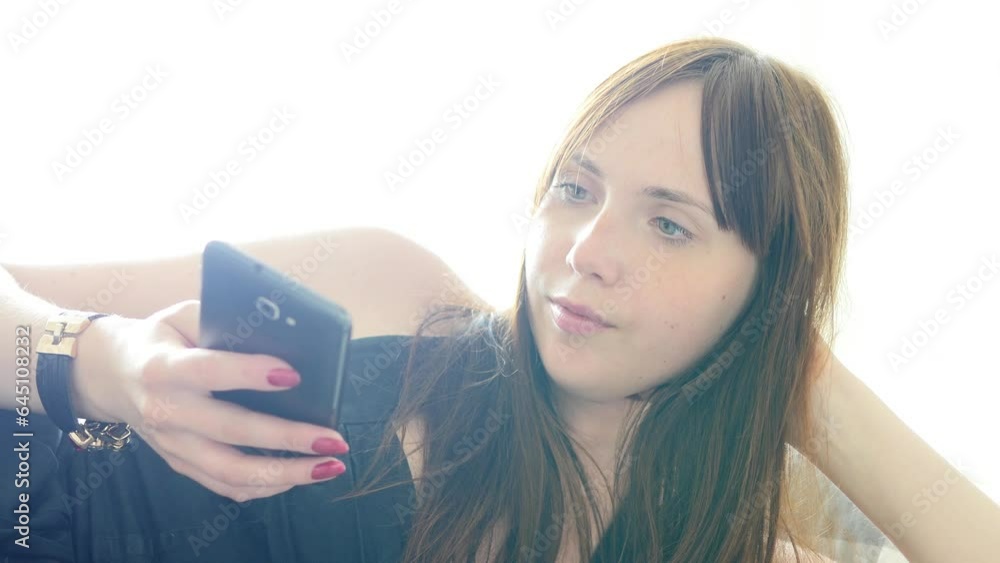 Modern Young Woman Using Mobile Smart Phone Device Modern Young Woman Using Mobile Smart Phone Device