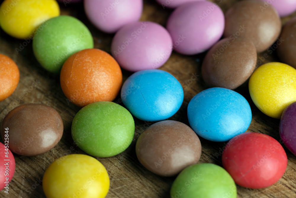 Multicolored chocolates with chocolate filling Multicolored chocolates with chocolate filling
