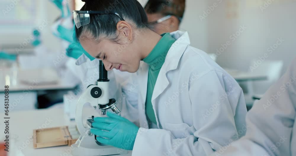 Science, classroom and students in laboratory with microscope for learning, lesson and education. Chemistry, school and girl with equipment for sample study, analysis and research at university Science, classroom and students in laboratory with microscope for learning, lesson and education. Chemistry, school and girl with equipment for sample study, analysis and research at university