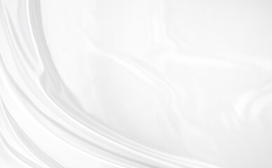 White gray satin texture that is white silver fabric silk background with beautiful soft blur pattern natural.