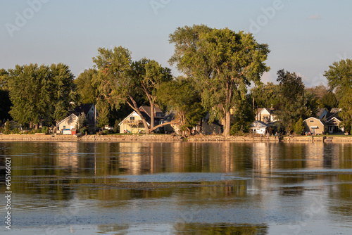 Winnebago Lake Reflections: Serene Skyline and Lakeside Houses