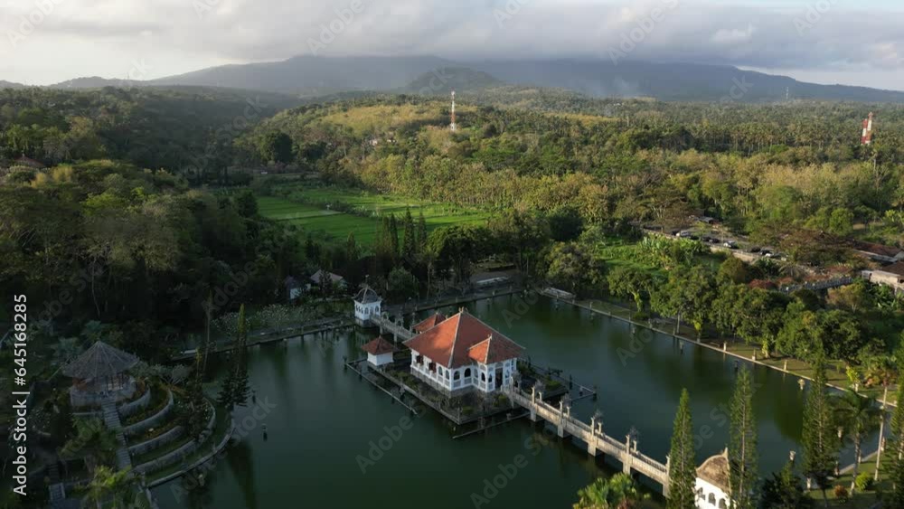 Beautiful ancient historic water palace surrounded by sea, water, ocean in the middle of rain forest with view from the sky Beautiful ancient historic water palace surrounded by sea, water, ocean in the middle of rain forest with view from the sky