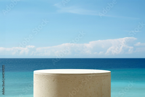 White marble podium cylinder with sea and blue sky background. High quality photo