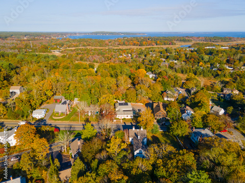 Kingston historic town center including Mayflower Congregational Church, Restoration Community Church and First Unitarian Church on Main Street aerial view with fall foliage, Massachusetts MA, USA. photo