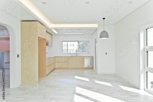 If you place wooden kitchen furniture in a white concept interior, it will not look good at all © Daewan