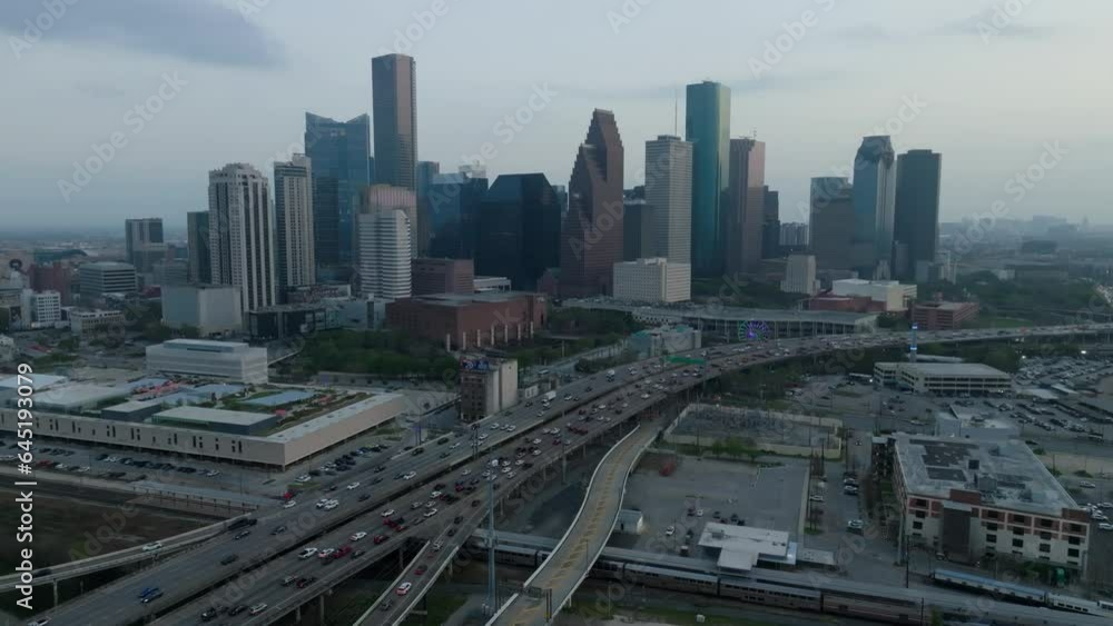 Trucking forward and pedestaling down drone shot of the Houston skyline Trucking forward and pedestaling down drone shot of the Houston skyline