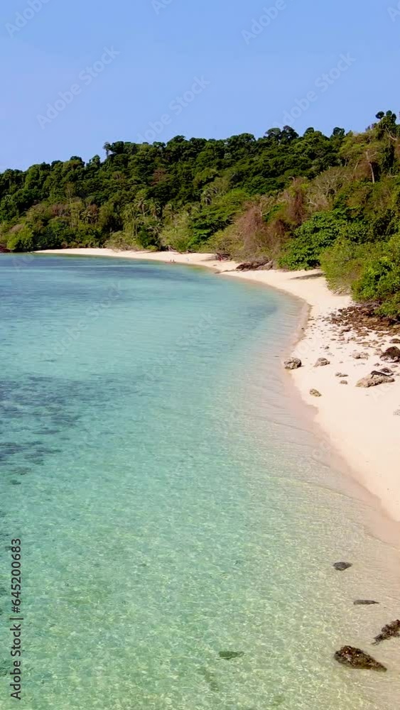 Drone aerial view of the Island of Koh KradanTrang in Thailand, aerial view over Koh Kradan Island Trang from above with a turqouse colored ocean Drone aerial view of the Island of Koh KradanTrang in Thailand, aerial view over Koh Kradan Island Trang from above with a turqouse colored ocean