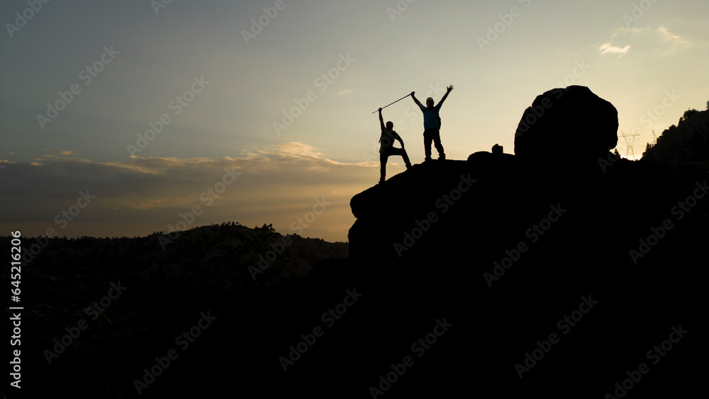 Success at the End of a Difficult Journey: The Moment of Victory of Two Mountaineers Success at the End of a Difficult Journey: The Moment of Victory of Two Mountaineers