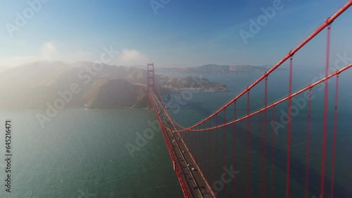 Wide shot, drone flying high over Golden Gate Bridge