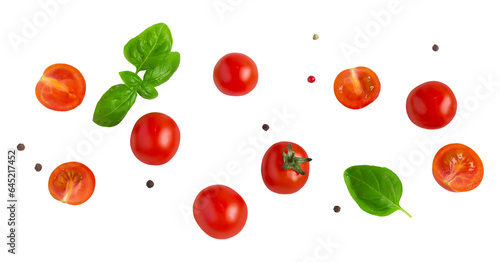 Cherry tomatoes with basil leaves cut out on transparent background