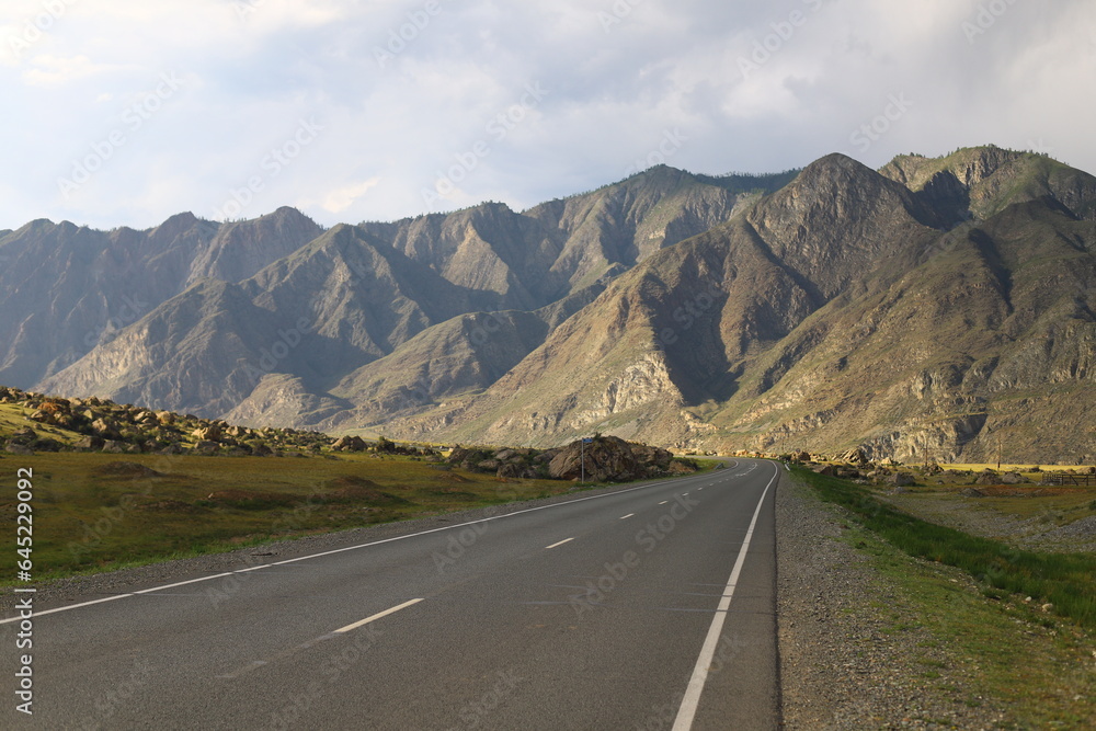 Landscape of one of the most beautiful roads in the world. Chuya Highway, route R256 on sunset. Landscape of one of the most beautiful roads in the world. Chuya Highway, route R256 on sunset.