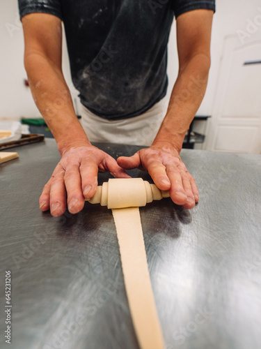 Wallpaper Mural Handmade professional bakery production baker croissant pastry rolling manufacture fresh butter raw measure dough closeup macro plate cut portion Torontodigital.ca