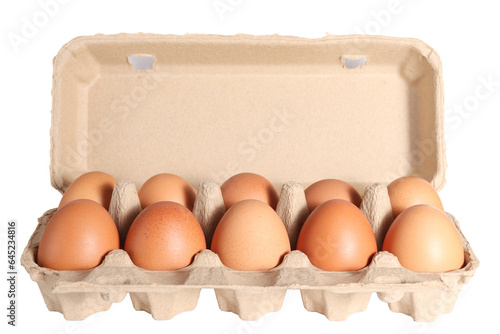 Egg carton with eggs isolated on a white background Fresh organic eggs in a cardboard box photo