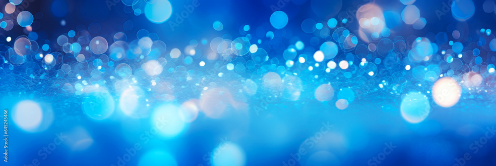 Blurred abstract blue bokeh background with glitter defocused lights and shadow. 