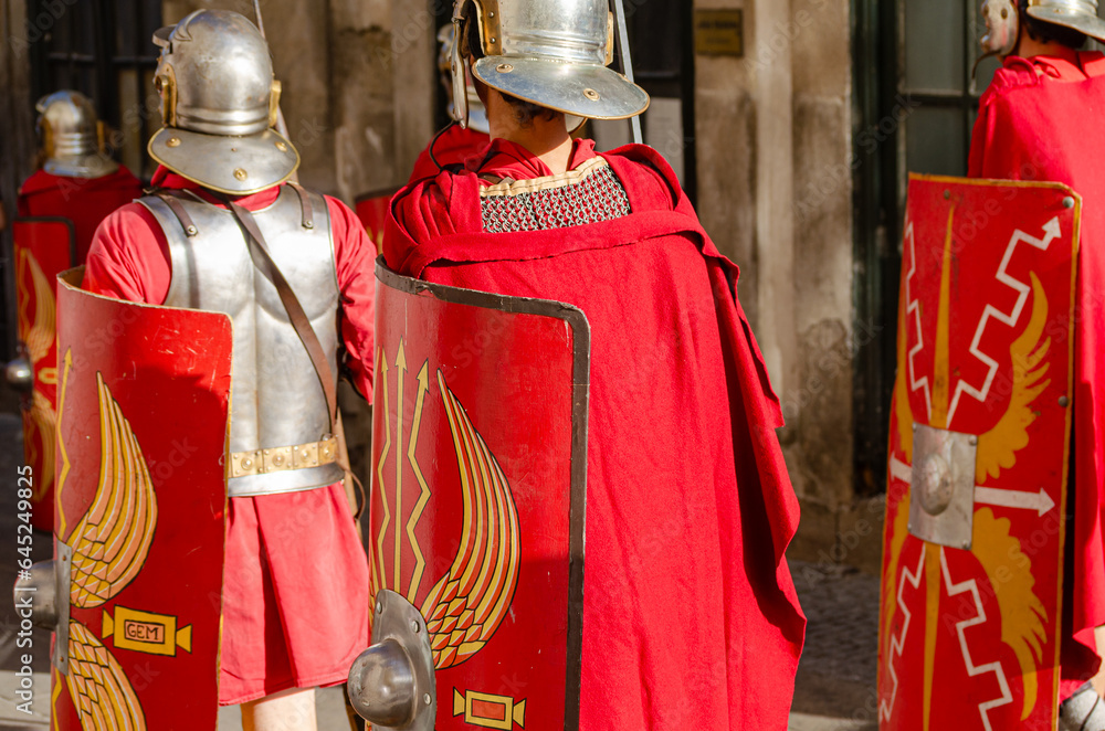 Men equipped as a Roman legionary, at a historical recreation party.