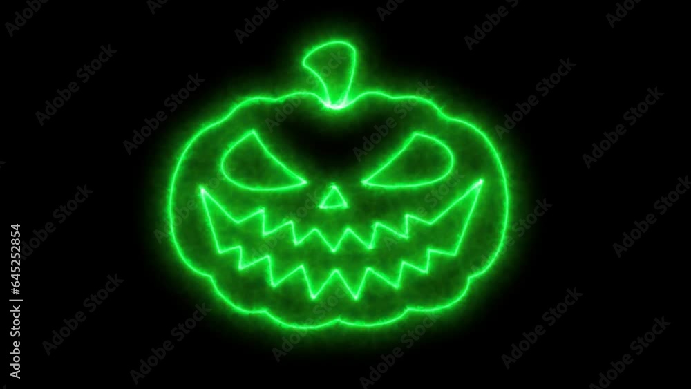 A green glowing pumpkin with carved eyes and a creepy smile on a ...