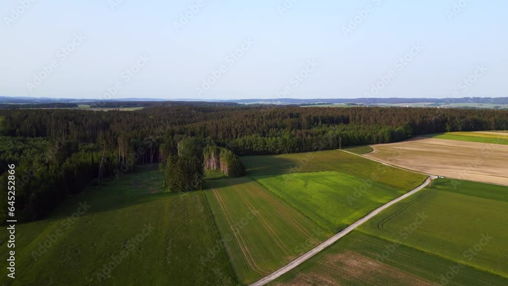 Majestic aerial view flight drone austria hunting Box field road sunset Europe Majestic aerial view flight drone austria hunting Box field road sunset Europe