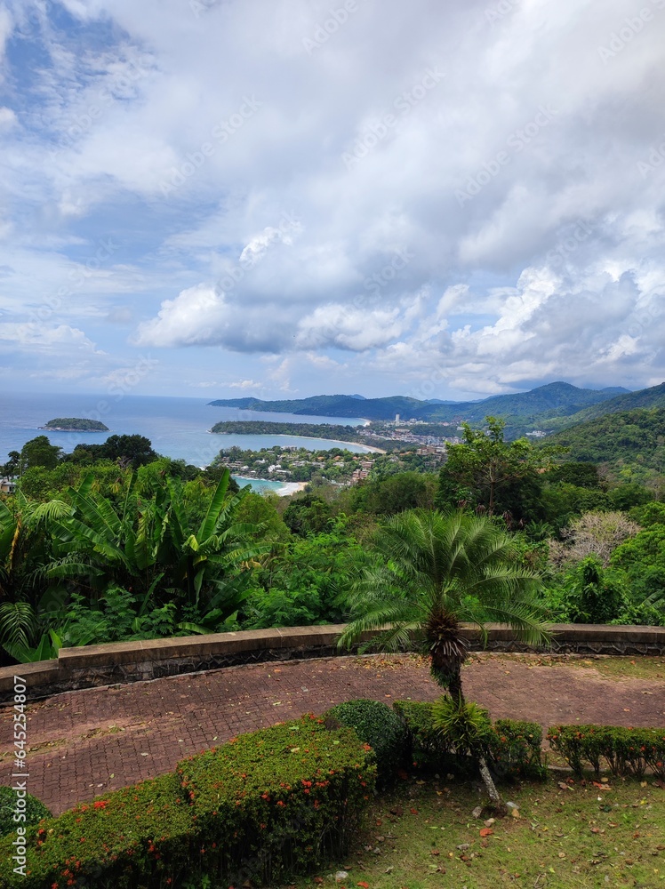 View from a high hill with a tropical forest to the sea bay