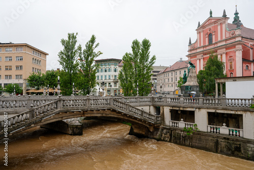 Lubiana's triple bridge (Tromostoje) during the floods (Ljubljana - Slovenia) photo