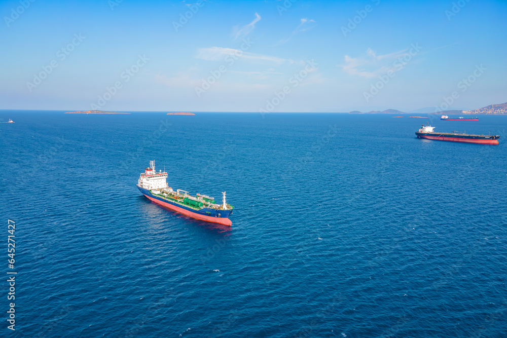 Aerial view of Oil chemical tanker sea ship anchored in sea waiting entering port