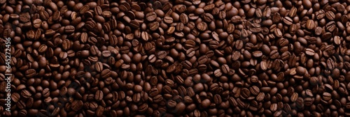 Roasted Coffee beans background, texture and copy spase, panorama top view.