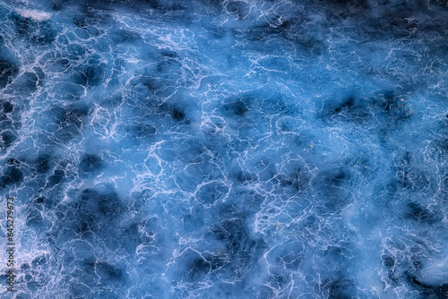 Fototapeta Naklejka Na Ścianę i Meble -  sea waves foam drone view abstract background ocean top