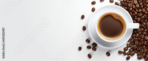 A mug of coffee on a table with beans on a white background