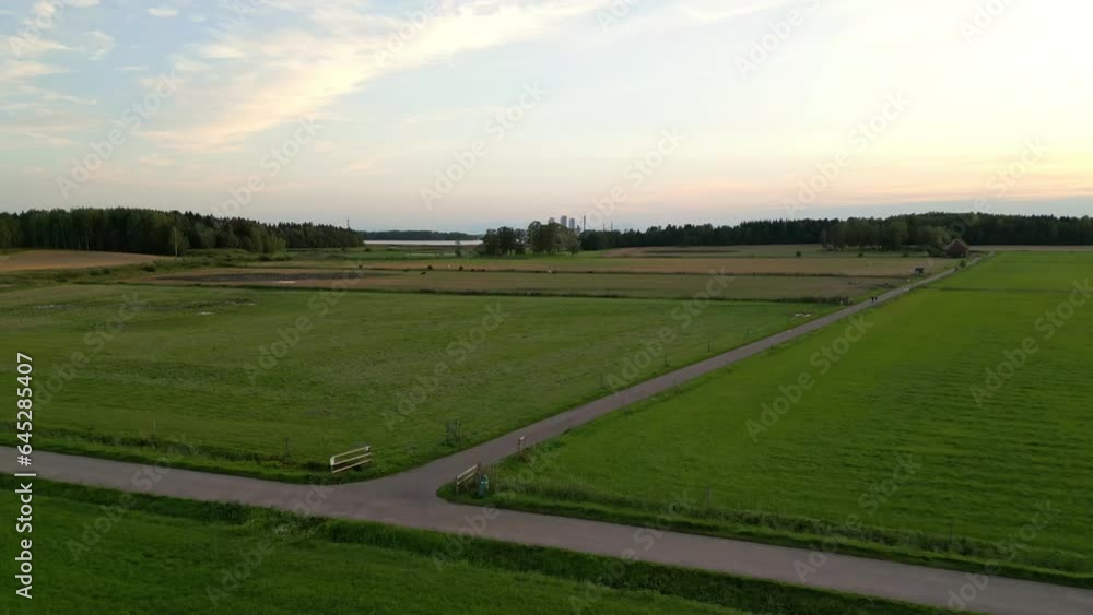 Central Helsinki revealed behind agricultural land Central Helsinki revealed behind agricultural land