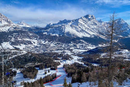 Scenic view of Tofana ski racing slope in Cortina d'Ampezzo in Italy against Cristallo Mountain photo
