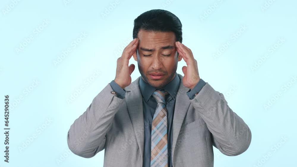 Businessman, headache and stress in pain, anxiety or mental health against a studio background. Tired asian man or business employee with migraine in depression, pressure or burnout on mockup space Businessman, headache and stress in pain, anxiety or mental health against a studio background. Tired asian man or business employee with migraine in depression, pressure or burnout on mockup space