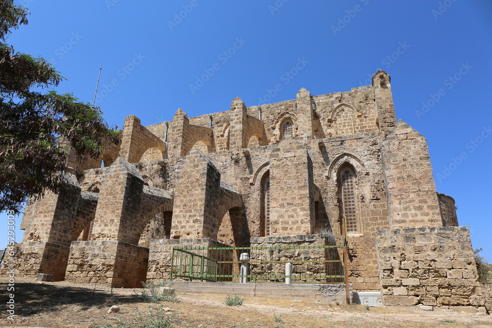 Side View of Church of St. Peter and Paul aka Bugday Mosque with a Ottoman Tomb in Famagusta, North Cyprus