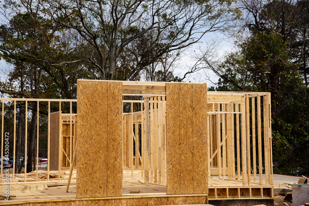 Timber frame house wooden beams with OSB (Oriented Strand Board