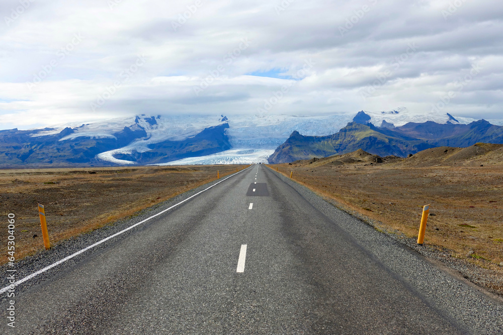 Straight road towards the impressive Vatnajökull, the largest ice cap in Iceland      