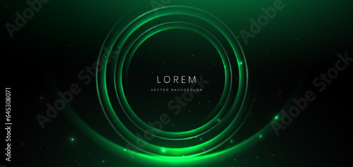 Abstract technology futuristic neon circle glowing green light lines with speed motion blur effect on dark green background.