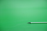 pen refill isolated green background