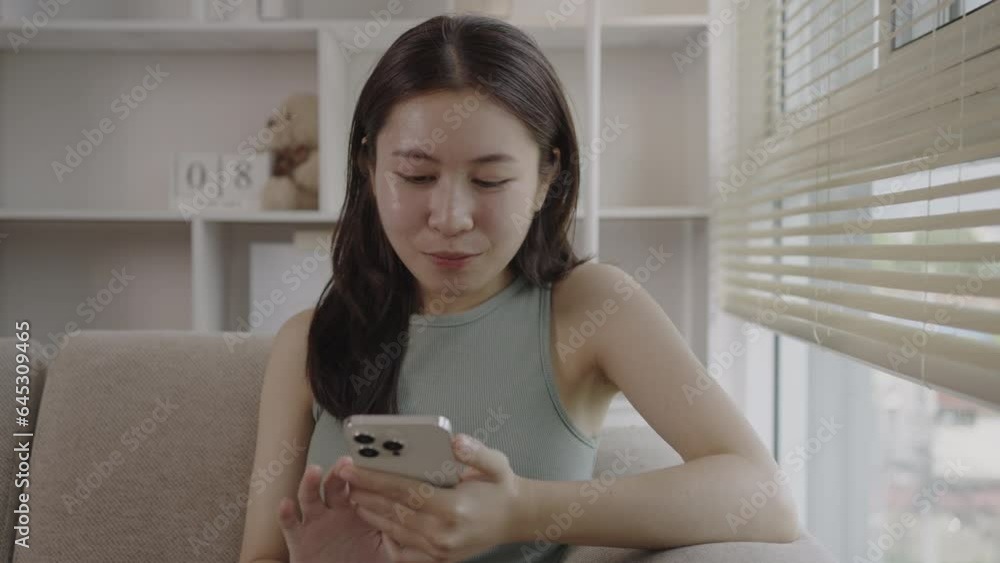 Young woman Happy and Laughing at Funny Mobile Clip, Watching Funny Clip on Mobile Phone, Entertainment and Joy, Happiness and Laughter. Young woman Happy and Laughing at Funny Mobile Clip, Watching Funny Clip on Mobile Phone, Entertainment and Joy, Happiness and Laughter.