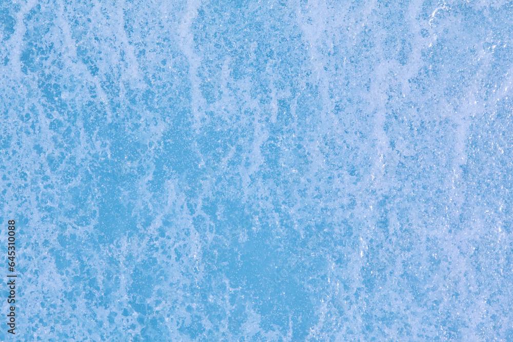 Texture of winter ice surface. Blue natural ice background Texture of winter ice surface. Blue natural ice background