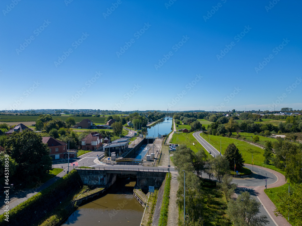 Lembeek, Halle, Vlaams Brabant, Belgium,Sep 5th 2023, cargo ship or barge passing on the Canal Brussels Charleroi, which is a man made waterway in Belgium. It's still in active use in transporting