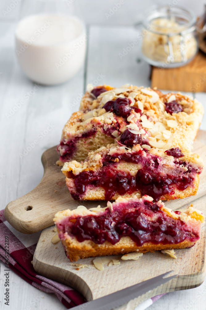 Cherry pie on a wooden cutting board. Homemade cherry pie. wooden background. Cherry pie on a wooden cutting board. Homemade cherry pie. wooden background.