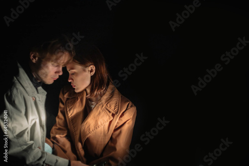 couple in love in the dark love, concept of secret relationship, comfort and intimacy.