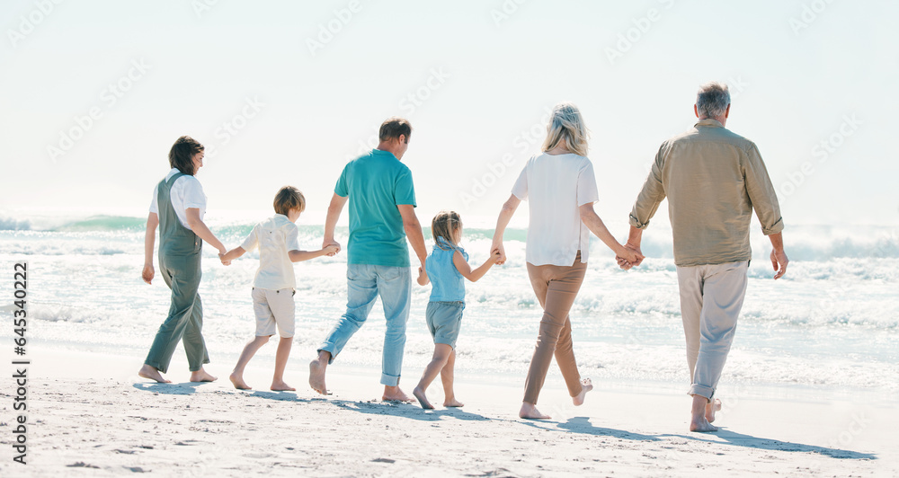 Love, travel and holding hands with big family on the beach for support, summer vacation or bonding. Freedom, health and relax with people walking on seaside holiday for adventure, trust or happiness