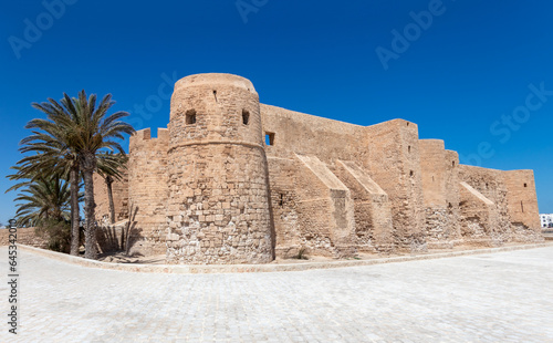Medieval fortress Bordj El Kebir at Mediterranean coast of Tunisia near Houmt El Souk town. Djerba island. photo