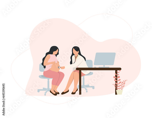the doctor is examining the pregnant woman in clinic