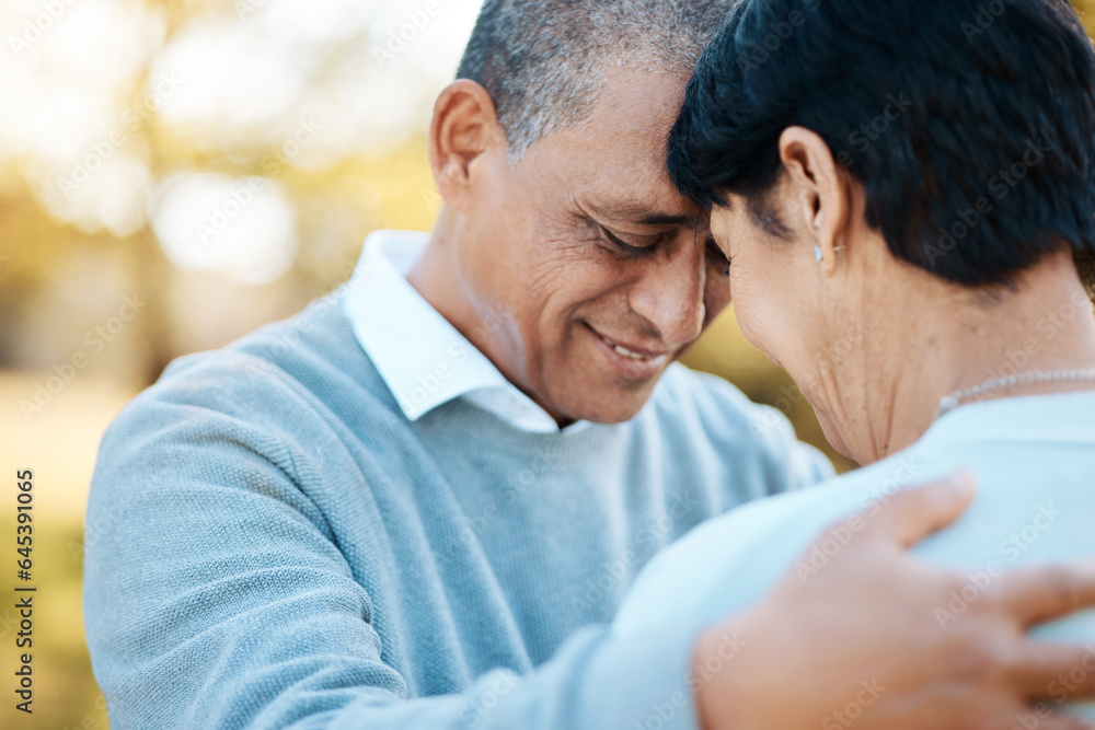 Happy, connection and senior couple hugging in a park on an outdoor date for romance, bonding or love. Smile, happiness and elderly man and woman in retirement in nature in field together at sunset. Happy, connection and senior couple hugging in a park on an outdoor date for romance, bonding or love. Smile, happiness and elderly man and woman in retirement in nature in field together at sunset.