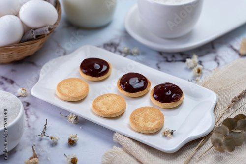Wallpaper Mural process of assembling tapas and cornstarch alfajores with dulce de leche and coconut with milk eggs sugar everything with white bajilla Torontodigital.ca
