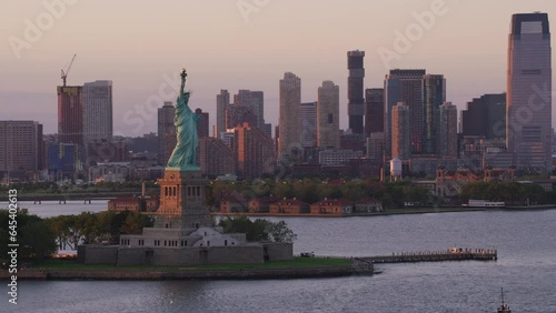 Aerial view of Statue of Liberty in New York City at sunset