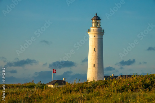 Iconic lighthouse of Hirsthals   Jutland  Denmark. The setting is extraordinary  surrounded by cliffs  dunes  sandy beaches and historical WWII bunkers