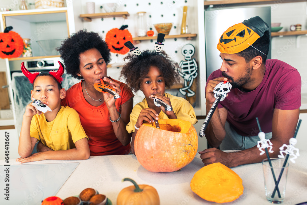 Family has fun in Halloween time Family has fun in Halloween time