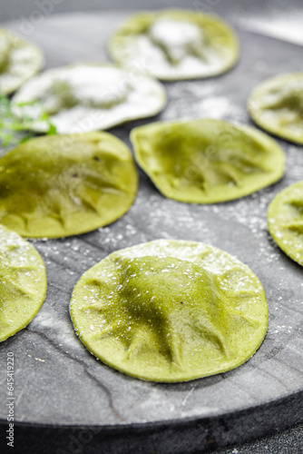green ravioli fresh green dough  spinach, basil vegetable food meal food snack on the table copy space