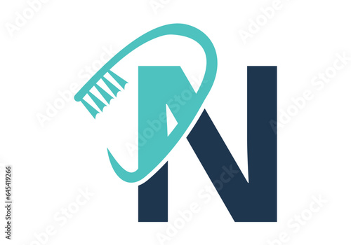 Initial Letter N Dental Logo Combine With Tooth Brush Symbol. Dental Care logo designs vector Template